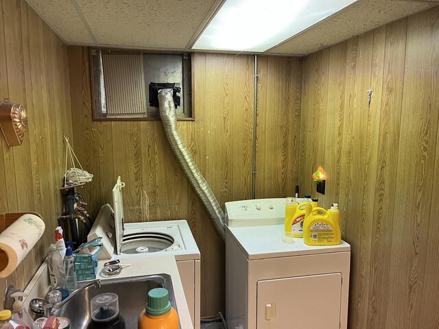 718 Plainfield Rd, Joliet, IL 60435 - laundry room with wood walls and independent washer and dryer