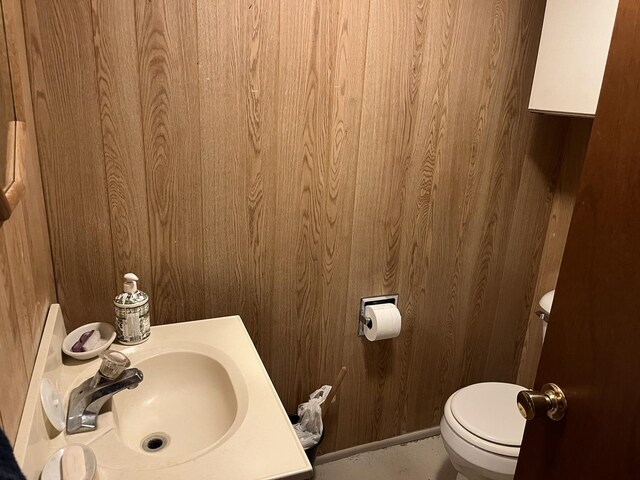 718 Plainfield Rd, Joliet, IL 60435 - bathroom with wooden walls and a sink