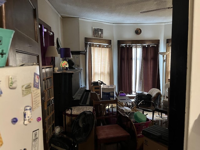 718 Plainfield Rd, Joliet, IL 60435 - living area with water heater and a textured ceiling