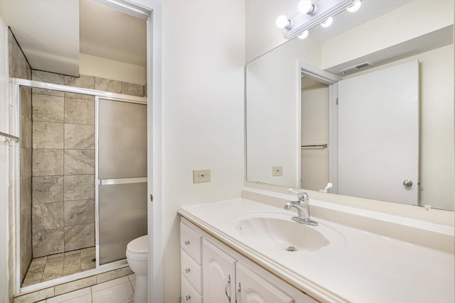1010 E Kevin Ct Unit 1804, Palatine, IL 60074 - bathroom featuring a shower stall, toilet, vanity, and tile patterned flooring