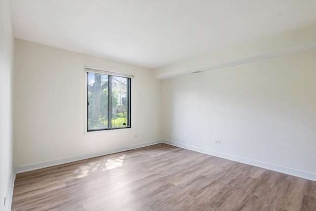 1010 E Kevin Ct Unit 1804, Palatine, IL 60074 - spare room with light wood-type flooring and baseboards