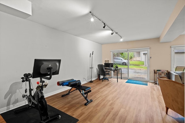 917 N Coolidge Ave, Palatine, IL 60067 - workout room with track lighting, baseboards, and wood finished floors