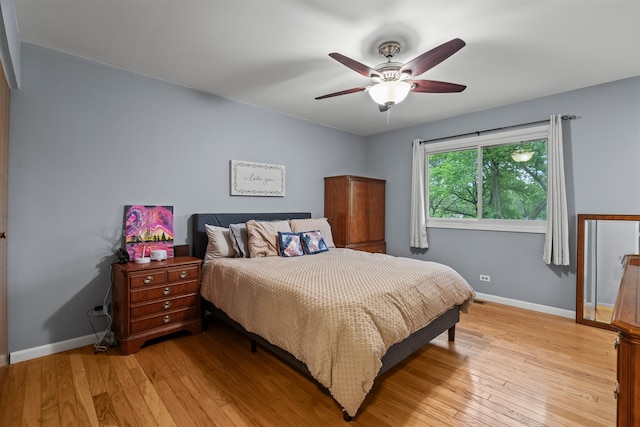 917 N Coolidge Ave, Palatine, IL 60067 - bedroom with light wood finished floors, baseboards, and a ceiling fan