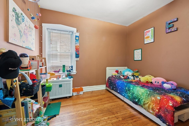4842 N California Ave, Chicago, IL 60625 - bedroom featuring wood finished floors and baseboards