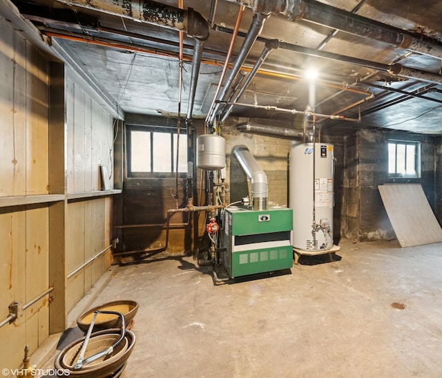 4842 N California Ave, Chicago, IL 60625 - basement featuring gas water heater and a heating unit
