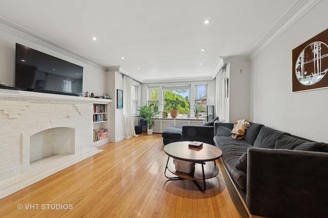 4842 N California Ave, Chicago, IL 60625 - living room featuring light wood-style floors, crown molding, and recessed lighting