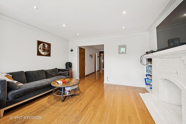 4842 N California Ave, Chicago, IL 60625 - living room featuring light wood finished floors, ornamental molding, a fireplace, recessed lighting, and baseboards