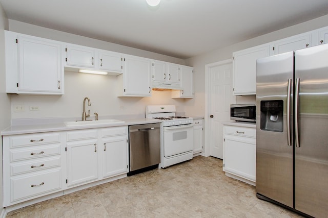 1402 Orange Ct Unit D, Mount Prospect, IL 60056 - kitchen with appliances with stainless steel finishes, a sink, white cabinets, and light countertops