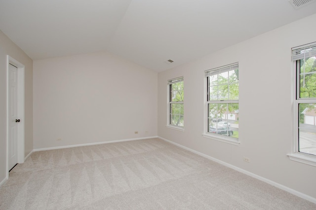 1402 Orange Ct Unit D, Mount Prospect, IL 60056 - empty room with lofted ceiling, healthy amount of natural light, light carpet, and baseboards