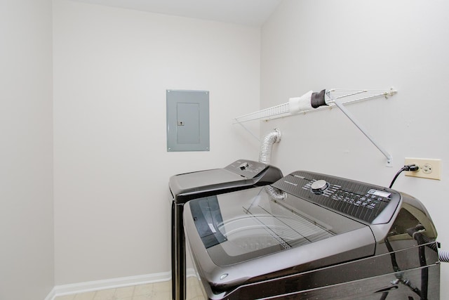 1402 Orange Ct Unit D, Mount Prospect, IL 60056 - laundry room featuring washer and dryer, electric panel, and baseboards