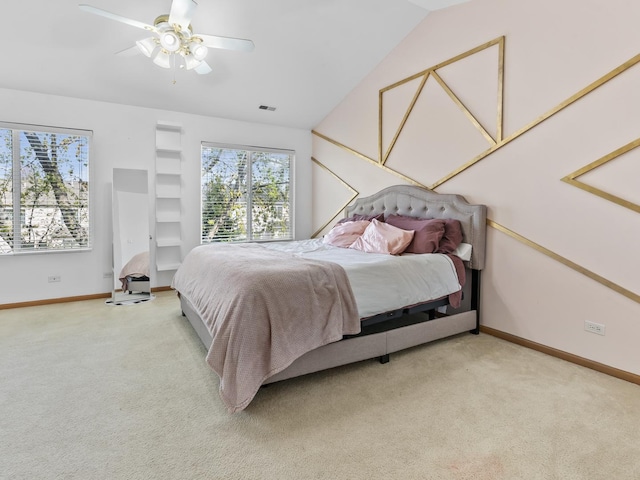 1874 Wisteria Dr, Aurora, IL 60503 - bedroom featuring light carpet, baseboards, lofted ceiling, and a ceiling fan