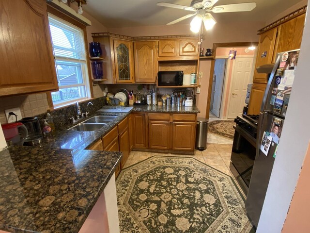 3846 Brummel St, Skokie, IL 60076 - kitchen with a sink, black microwave, brown cabinets, and ceiling fan