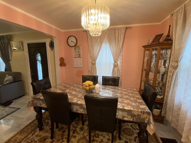 3846 Brummel St, Skokie, IL 60076 - dining space with a chandelier and ornamental molding