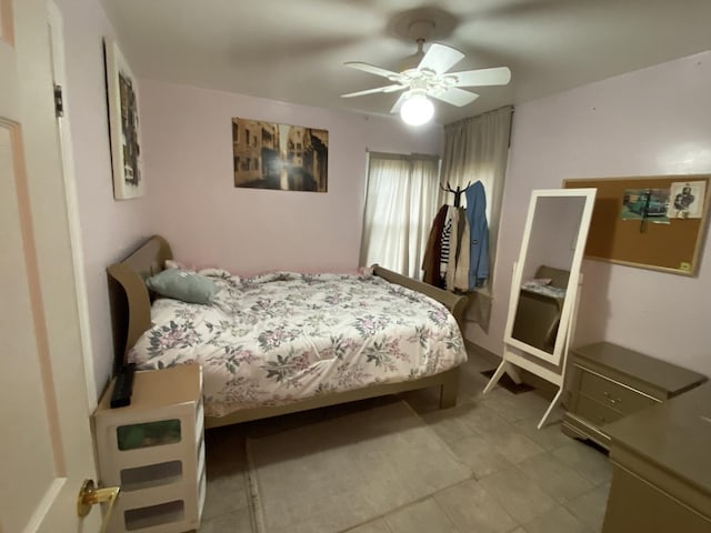 3846 Brummel St, Skokie, IL 60076 - tiled bedroom featuring a ceiling fan