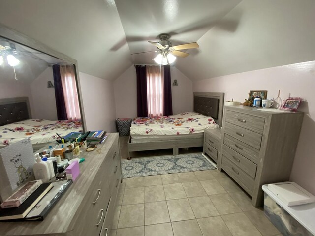 3846 Brummel St, Skokie, IL 60076 - bedroom with light tile patterned floors, vaulted ceiling, and a ceiling fan