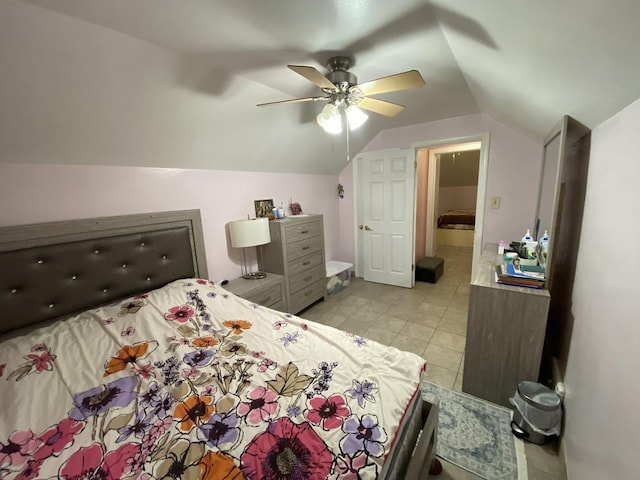 3846 Brummel St, Skokie, IL 60076 - bedroom with vaulted ceiling, a ceiling fan, and light tile patterned floors
