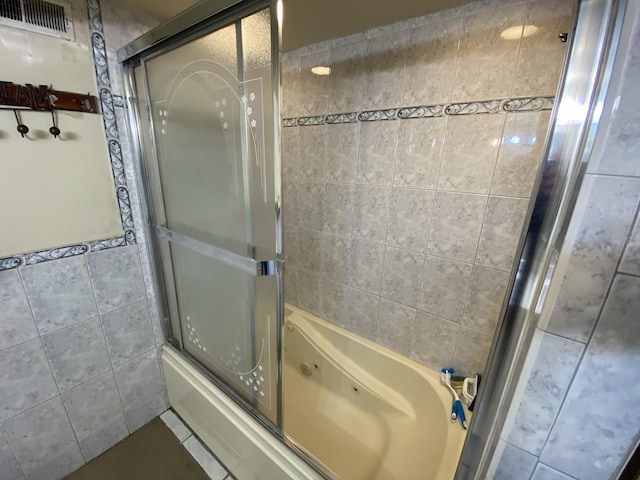 3846 Brummel St, Skokie, IL 60076 - full bath featuring a combined bath / shower with jetted tub, tile walls, and tile patterned floors