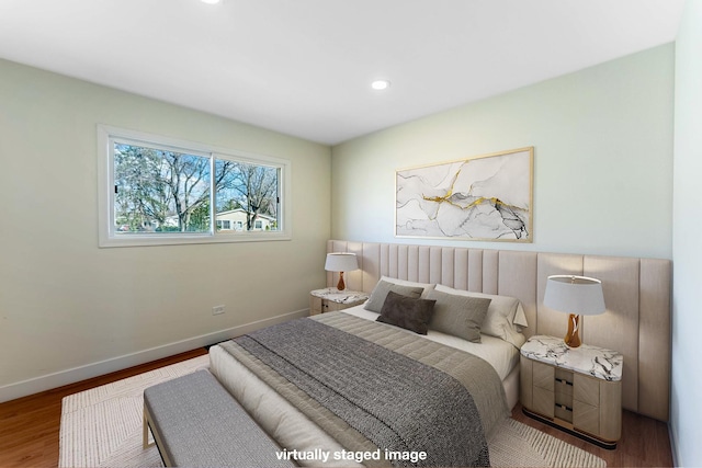 617 Tanglewood Dr, Streamwood, IL 60107 - bedroom featuring wood finished floors, baseboards, and recessed lighting