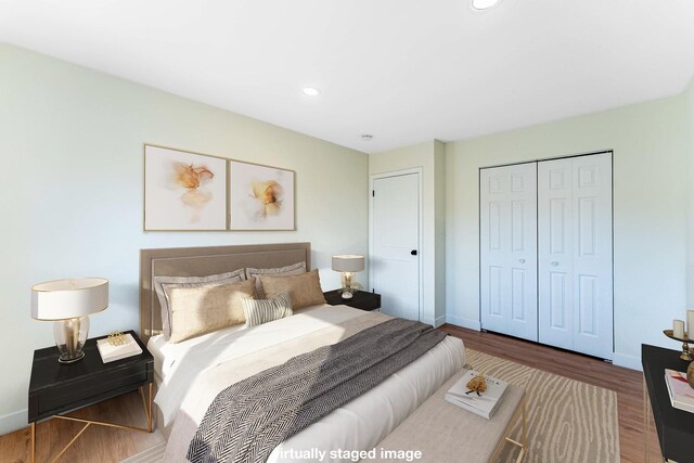 617 Tanglewood Dr, Streamwood, IL 60107 - bedroom with wood finished floors, a closet, baseboards, and recessed lighting
