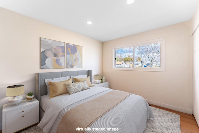 617 Tanglewood Dr, Streamwood, IL 60107 - bedroom with wood finished floors, baseboards, and recessed lighting