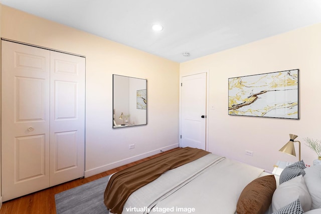 617 Tanglewood Dr, Streamwood, IL 60107 - bedroom with wood finished floors, a closet, recessed lighting, and baseboards