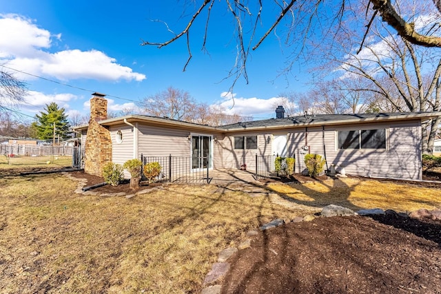 617 Tanglewood Dr, Streamwood, IL 60107 - rear view of property with a chimney