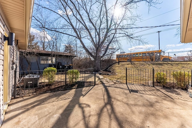 617 Tanglewood Dr, Streamwood, IL 60107 - view of patio featuring fence and central AC unit