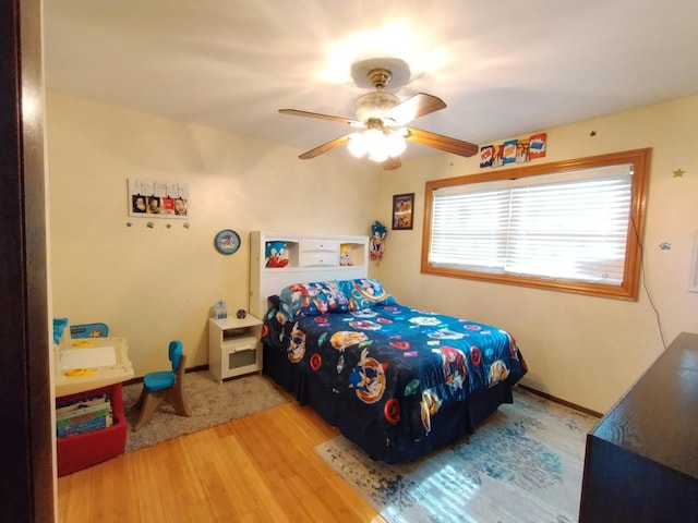 1173 Lucas St, Calumet City, IL 60409 - bedroom featuring wood finished floors and ceiling fan