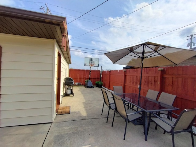 1173 Lucas St, Calumet City, IL 60409 - view of patio with outdoor dining area and a fenced backyard
