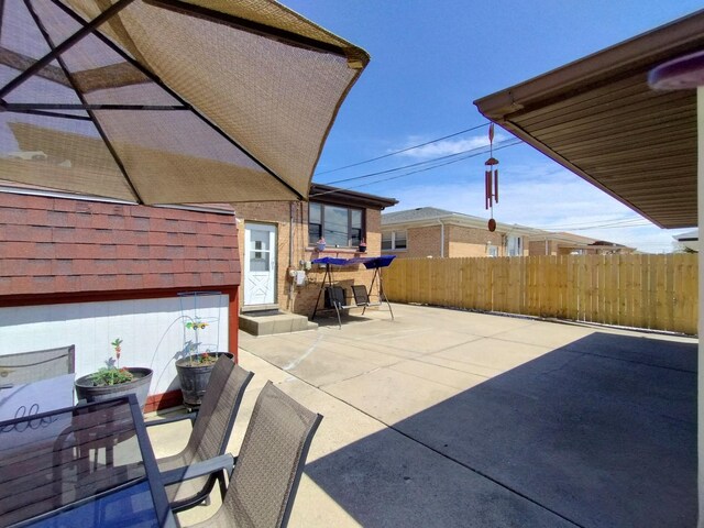 1173 Lucas St, Calumet City, IL 60409 - view of patio / terrace with fence
