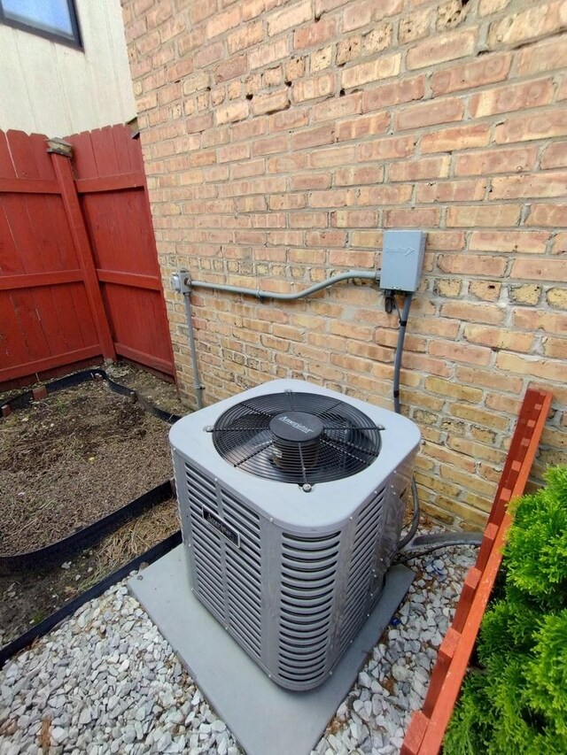 1173 Lucas St, Calumet City, IL 60409 - exterior view of central air condition unit and brick siding