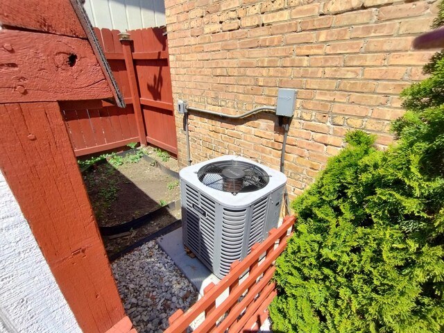 1173 Lucas St, Calumet City, IL 60409 - exterior view of central AC unit and brick siding