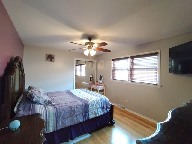 1173 Lucas St, Calumet City, IL 60409 - bedroom featuring light wood-type flooring, a ceiling fan, and baseboards