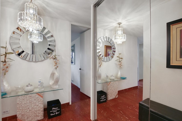 2605 S Indiana Ave Unit 402, Chicago, IL 60616 - hall featuring a chandelier and tile patterned floors