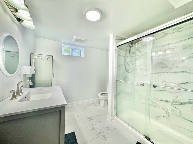 8344 N Milwaukee Ave, Niles, IL 60714 - full bath featuring toilet, a marble finish shower, marble look tile flooring, vanity, and baseboards