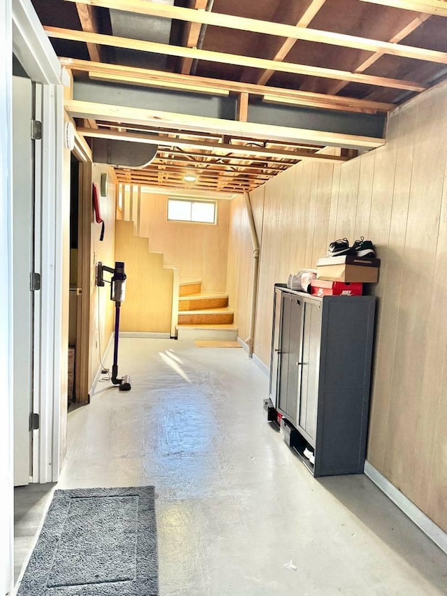 8344 N Milwaukee Ave, Niles, IL 60714 - below grade area featuring stairway, wooden walls, and baseboards