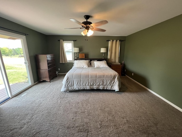 7427 Mccurry Rd, Roscoe, IL 61073 - bedroom featuring carpet flooring, baseboards, access to outside, and ceiling fan