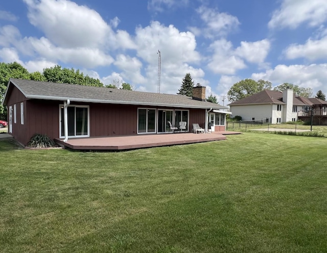 7427 Mccurry Rd, Roscoe, IL 61073 - back of property featuring a chimney, a wooden deck, and a shingled roof