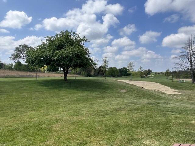 7427 Mccurry Rd, Roscoe, IL 61073 - view of property's community with a lawn
