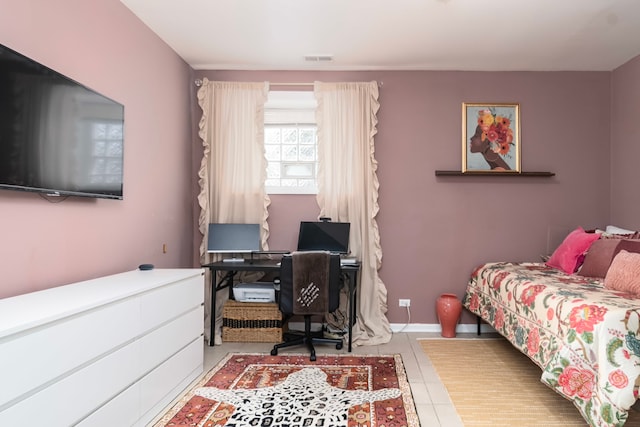 4639 S Saint Lawrence Ave Unit 2, Chicago, IL 60653 - bedroom featuring tile patterned floors, an office area, and baseboards