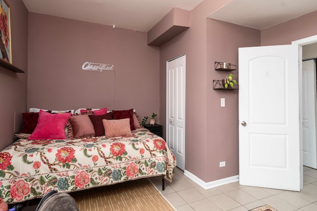 4639 S Saint Lawrence Ave Unit 2, Chicago, IL 60653 - bedroom with light tile patterned flooring and baseboards