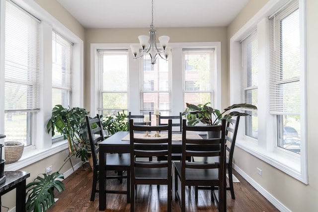 4639 S Saint Lawrence Ave Unit 2, Chicago, IL 60653 - dining room with plenty of natural light, dark wood-style flooring, and a chandelier