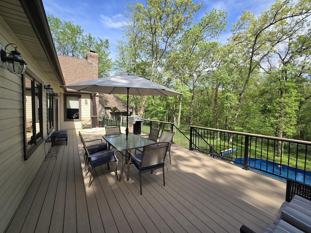 24-114 Lake Carroll Blvd, Lake Carroll, IL 61046 - wooden terrace featuring outdoor dining area