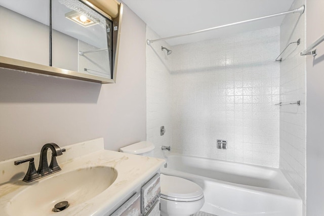 bathroom with toilet, bathing tub / shower combination, and vanity