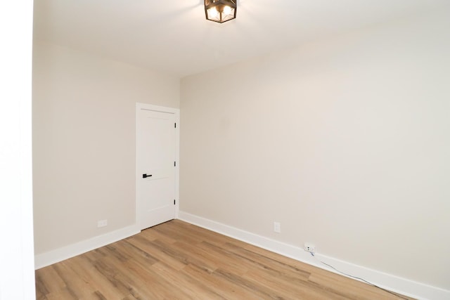 6110 S Saint Lawrence Ave, Chicago, IL 60637 - unfurnished dining area featuring a chandelier, wood finished floors, and baseboards