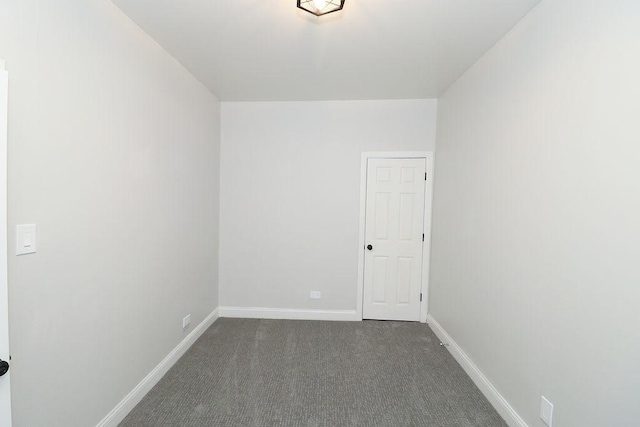 6110 S Saint Lawrence Ave, Chicago, IL 60637 - spare room with dark colored carpet and baseboards