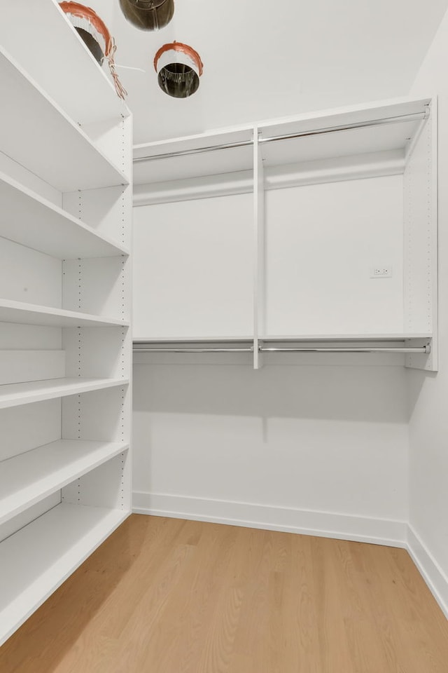 3204 N Kostner Ave Unit 307, Chicago, IL 60618 - spacious closet with wood finished floors