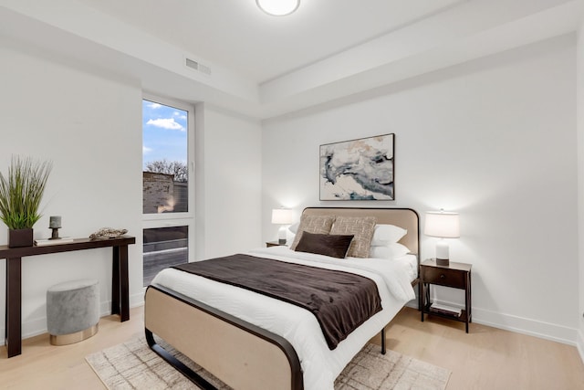3204 N Kostner Ave Unit 307, Chicago, IL 60618 - bedroom with light wood-style floors and baseboards
