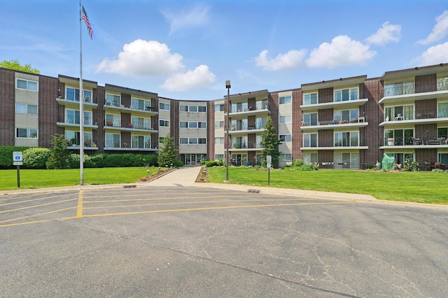 5540 Walnut Ave Unit 26C, Downers Grove, IL 60515 - view of apartment building / complex featuring uncovered parking
