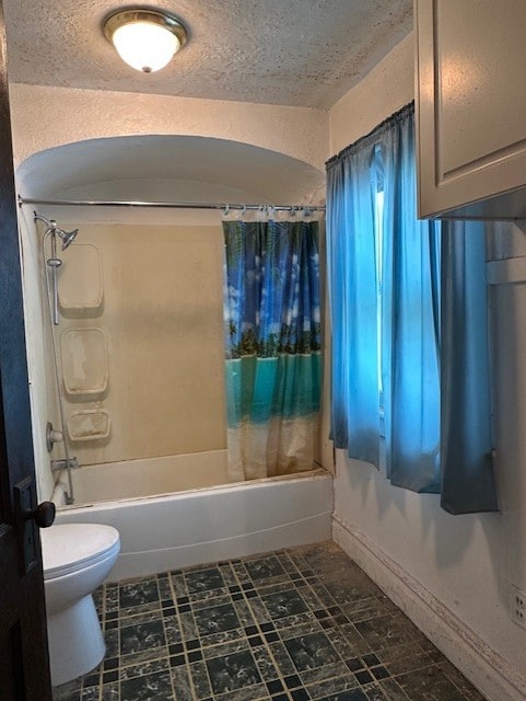 301 S Hebbard St, Joliet, IL 60433 - bathroom featuring shower / bath combination with curtain, toilet, and a textured ceiling